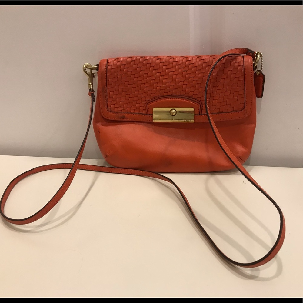 Orange crossbody coach purse